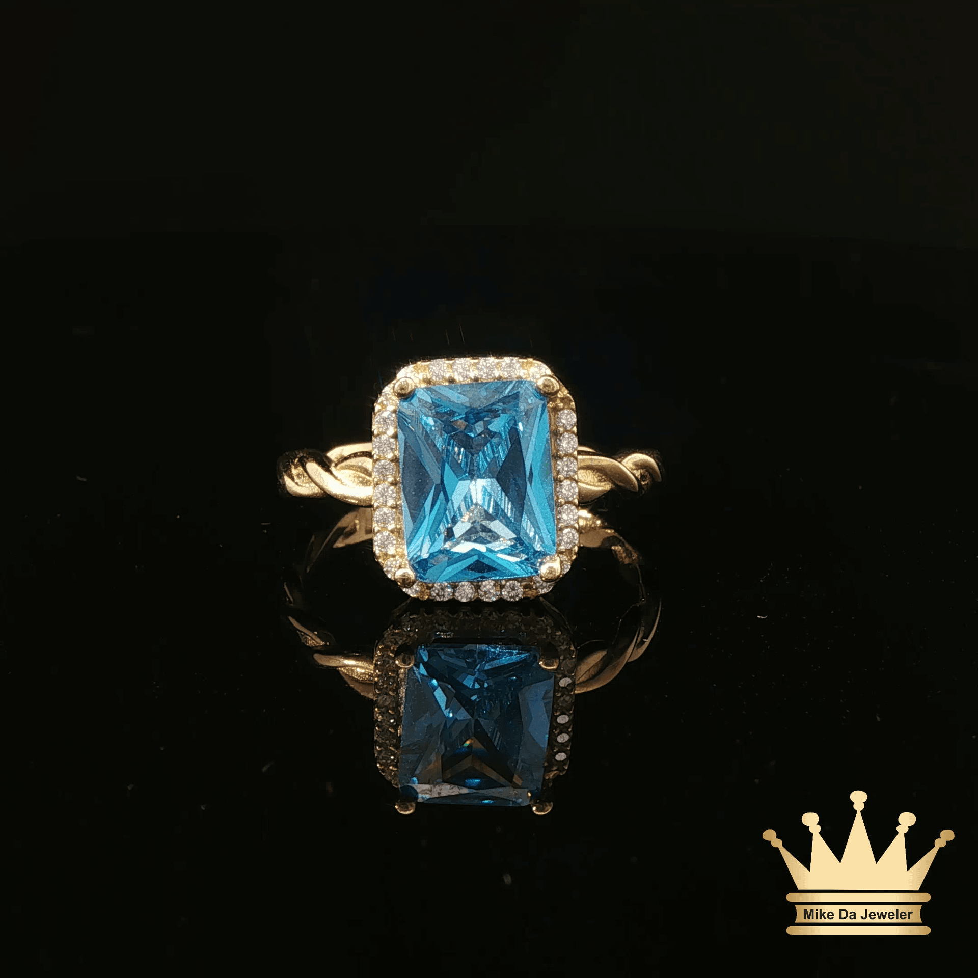 14K Yellow Gold Rope Style Ring with Blue Cubic Zirconia Halo