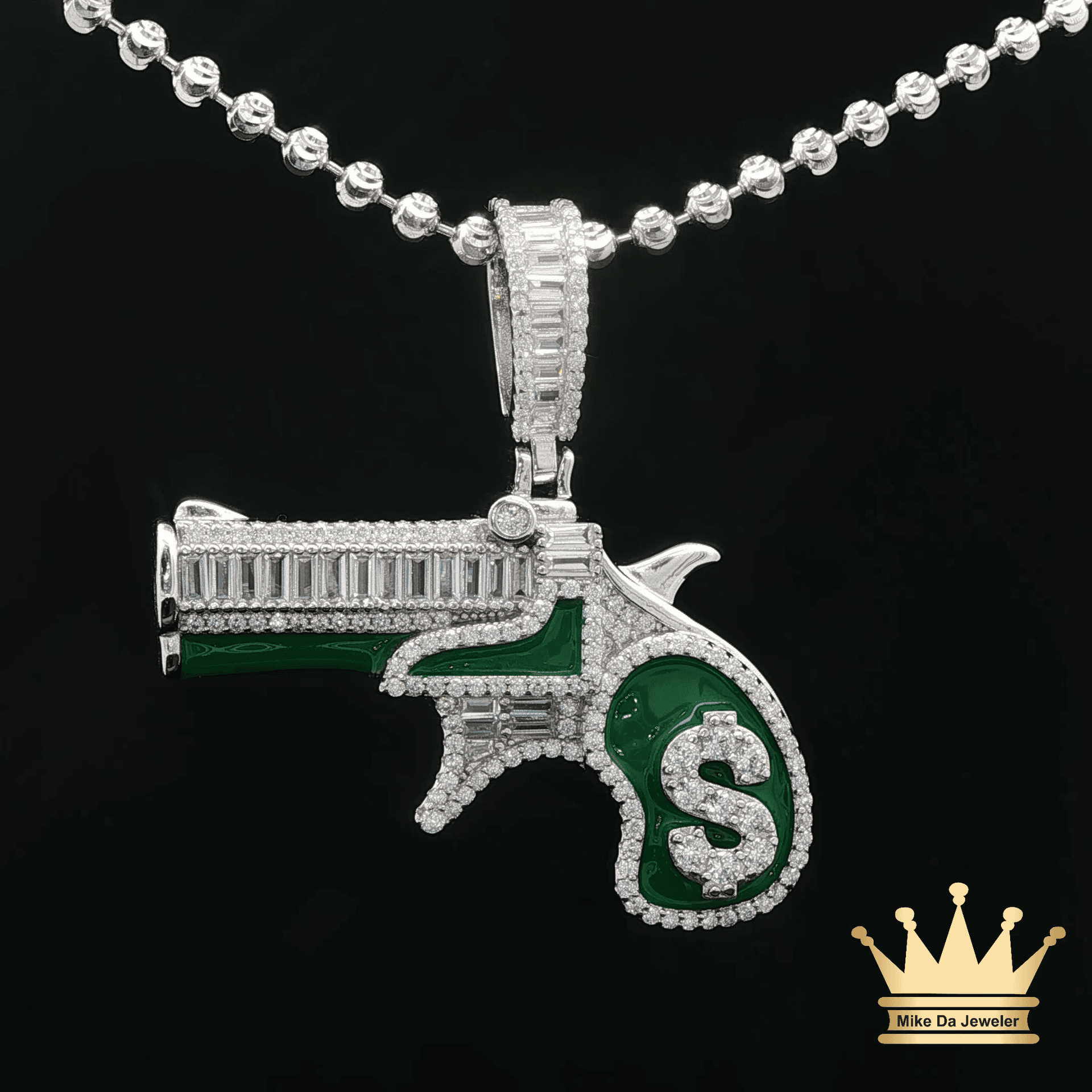 Silver Revolver Pendant with Green Enamel Accents