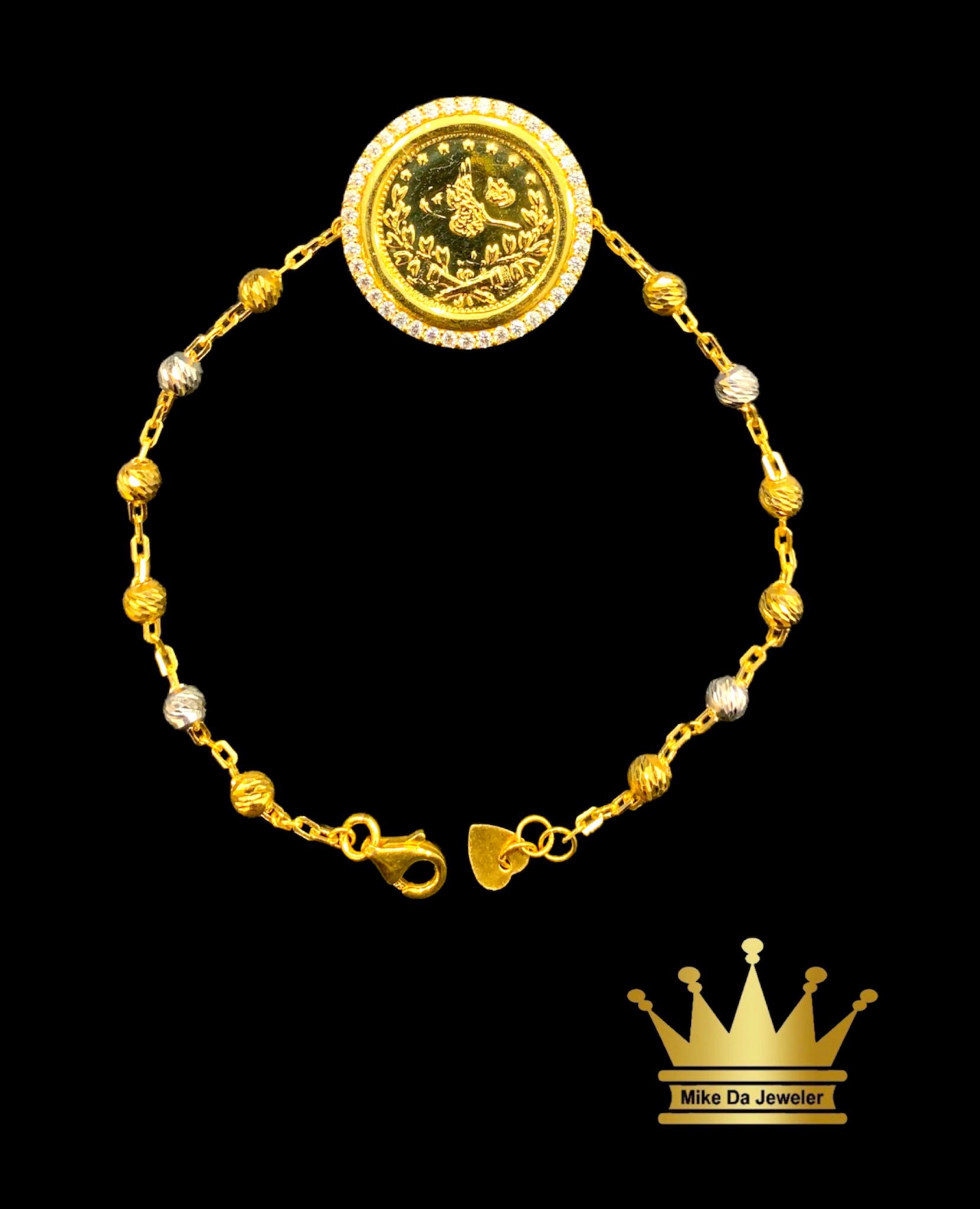 21 k yellow and white gold with cubic zirconia Kuwait gold coin bracelet size 7.5 inch weight 7.770mg  price $820