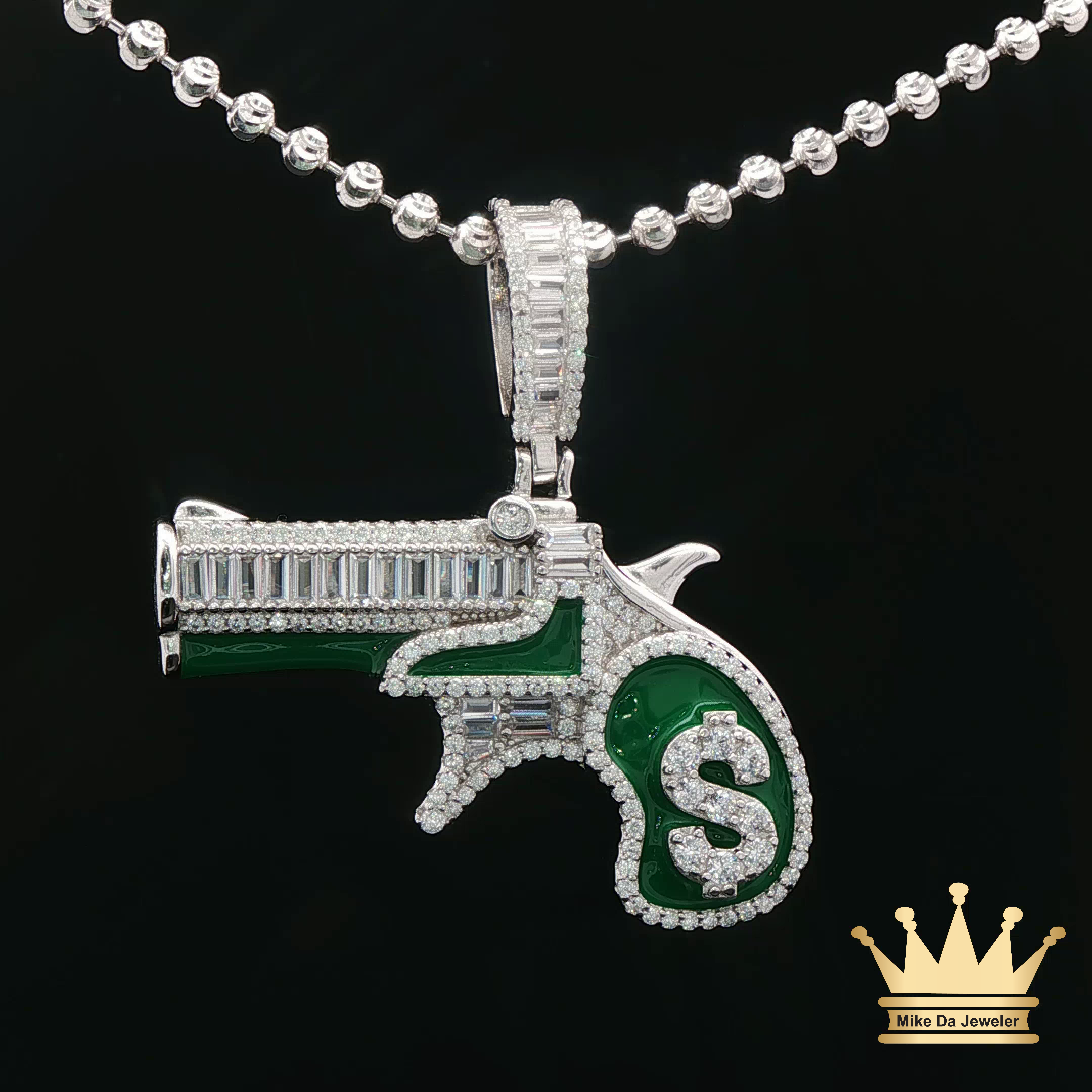 Silver Revolver Pendant with Green Enamel Accents