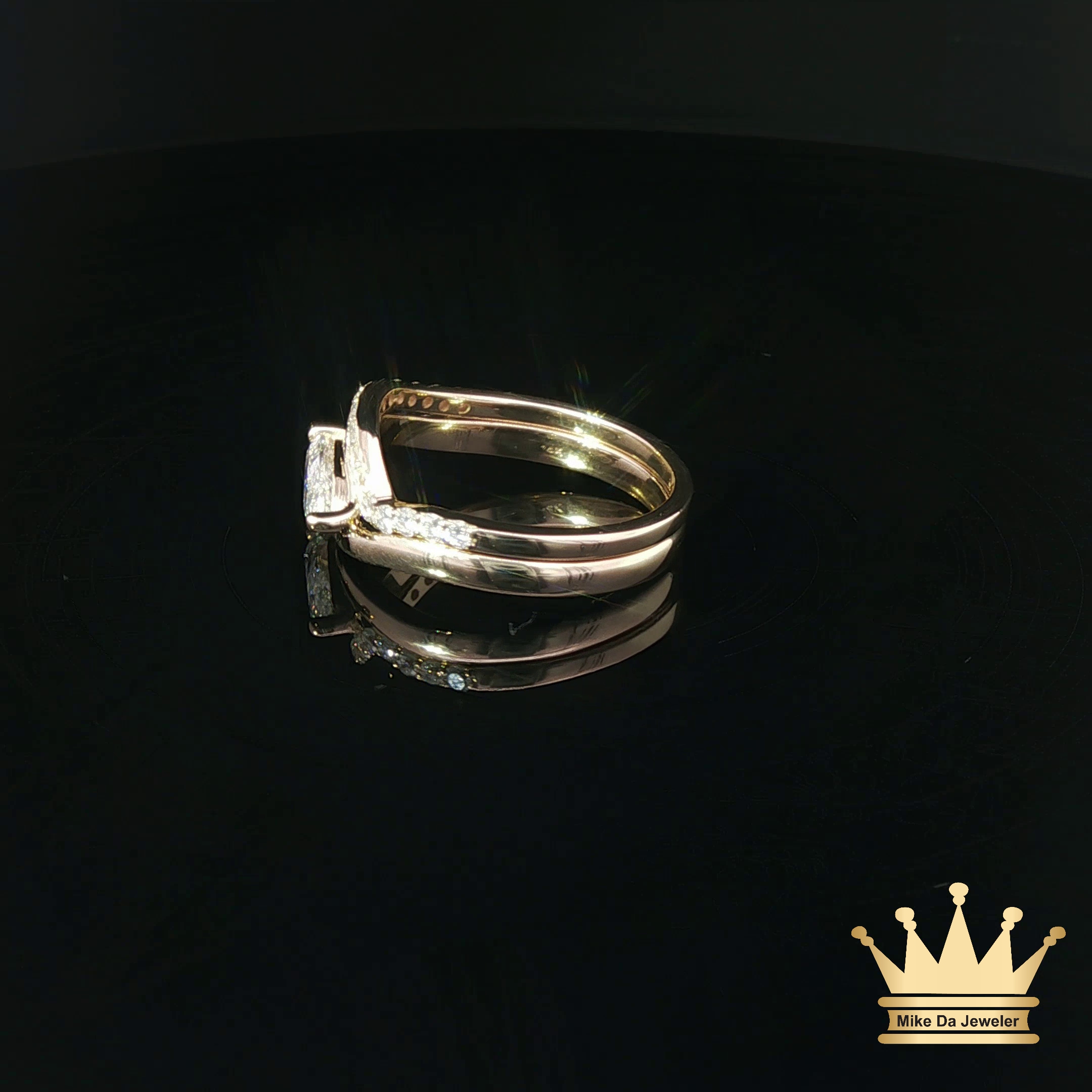 Pear-Shaped Diamond Bypass Engagement Ring and Contoured Diamond Band Set in Yellow Gold