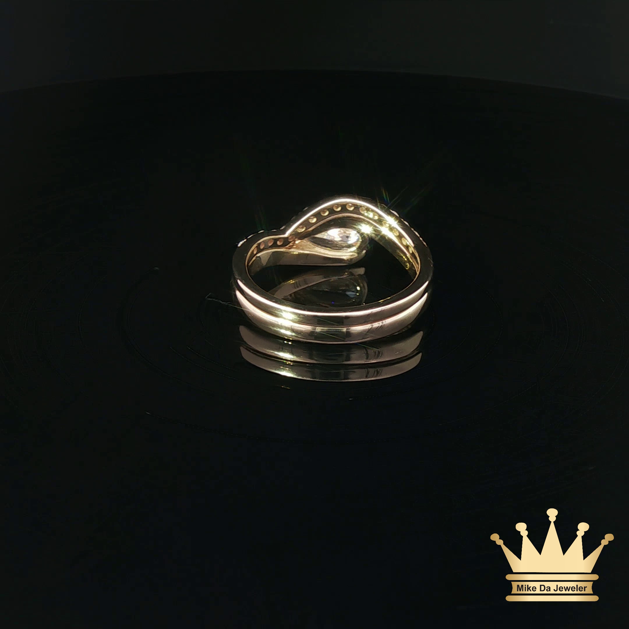 Pear-Shaped Diamond Bypass Engagement Ring and Contoured Diamond Band Set in Yellow Gold